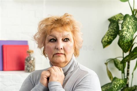 Head Shot Mature Woman Looking At Camera And Talking Grandmother Chatting With Relative Online