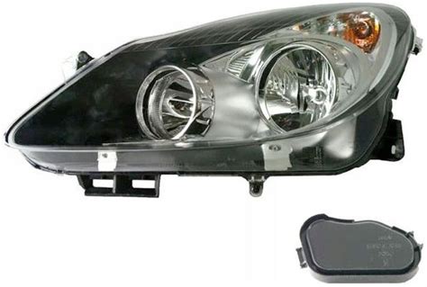 Lampa przednia Tyc Reflektor Główny Opel Corsa D 06 Lewy 1216194