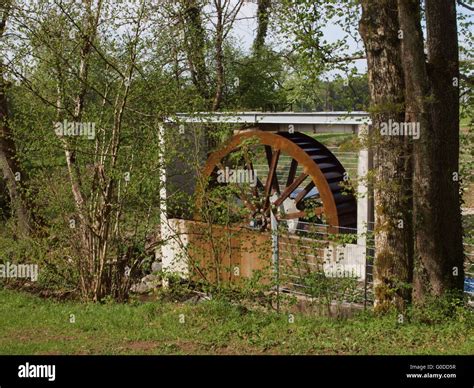 Waterwheel To Generate Electricity Stock Photo Alamy