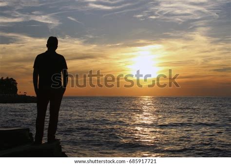 Silhouette Young Man Standing Straight Looking Stock Photo 685917721