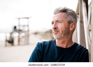 Thoughtful Mature Man Gray Hair Beach Stock Photo 2188273729 Shutterstock