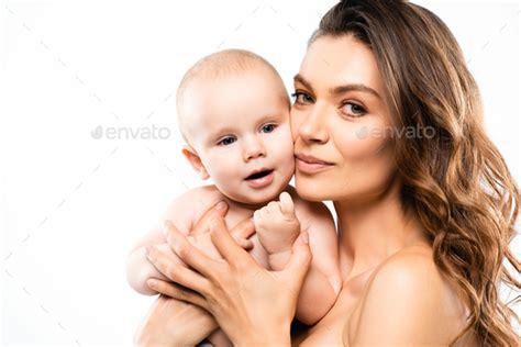 Portrait Of Happy Naked Mother Holding Baby Isolated On White Stock