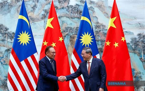 Chinese Premier And PM Anwar Meet In Shanghai Discuss Deepening Ties