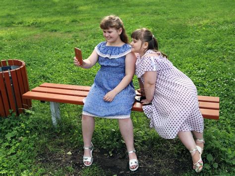 Two Chubby Girls Take Selfie On A Smartphone Stock Image Image Of Obesity Plus 188040873