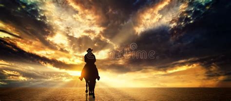 Cowboy on a Horse at Sunset Stock Image - Image of horseback, dawn: 241813637