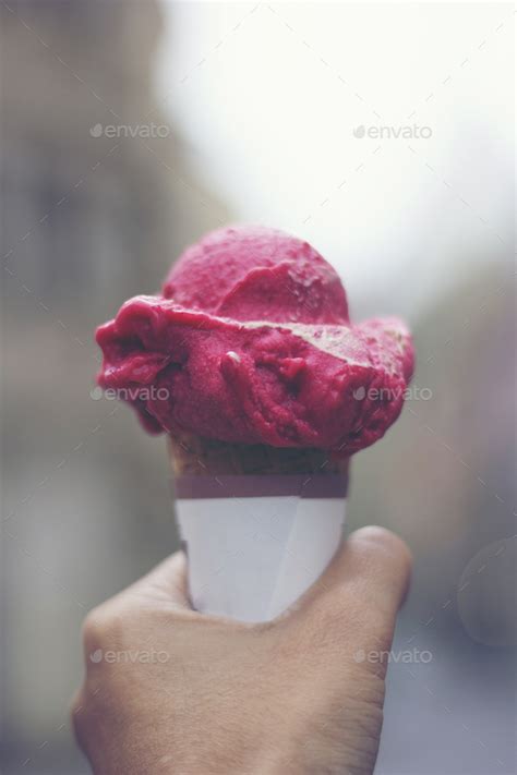 Woman S Hands Holding Melting Ice Cream Waffle Cone In Hands On Summer