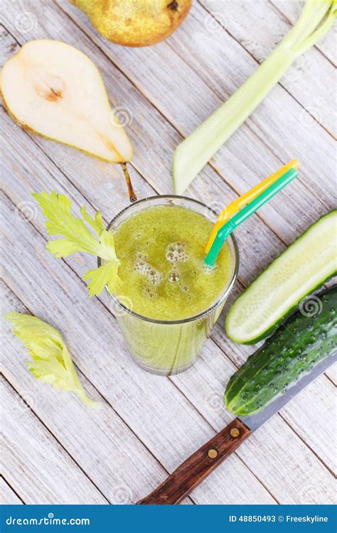 Fresh Cucumber Pear And Celery Juice Slices Of Fruits And Vegetables