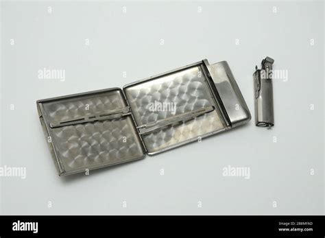 Vintage Metal Cigarette Case With Lighter Stock Photo Alamy