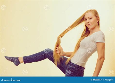 Blonde Girl Brushing Her Long Hair Stock Image Image Of Healthy Teen