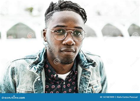 Portrait Of Handsome African American Man Smiling In The Street With