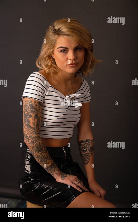 Portrait Of Beautiful Woman With Tattoos Stock Photo Alamy