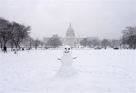 Photos: Washington has more than enough snow to ski on, and it’s perfect for building a snowman ...