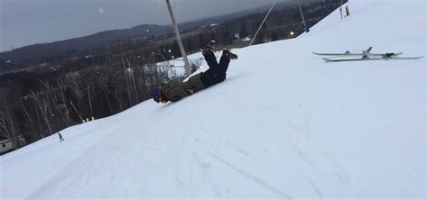 Skier Slips Out Of His Skis After Failing Miserably While Jumping Over