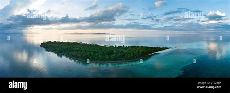 Sunrise Illuminates The Remote Island Of Koon Near Seram Indonesia