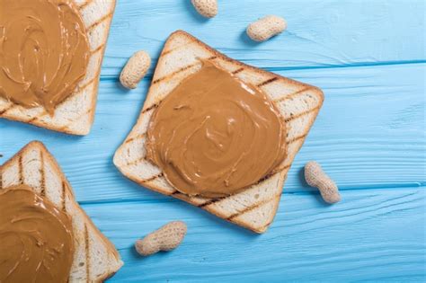 Premium Photo Peanut Butter Sandwiches Or Toasts On Wooden Background