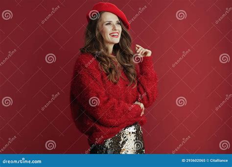 Happy Stylish Middle Aged Woman With Long Wavy Hair In Red Sweater And