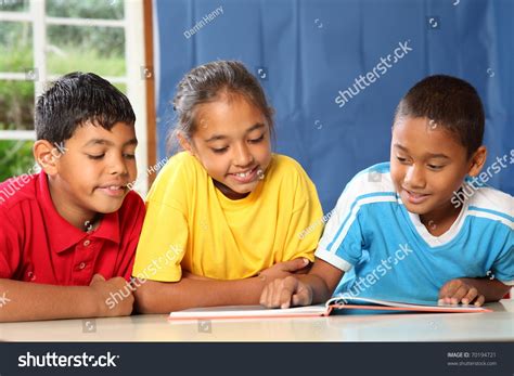 Three Primary School Friends Reading Learning Stock Photo 70194721 ...