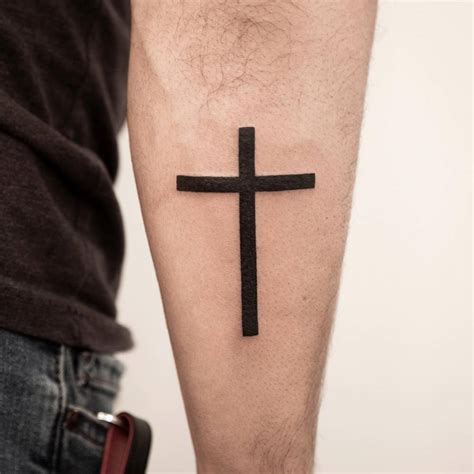 Minimalistic Cross Tattoo Done On The Forearm