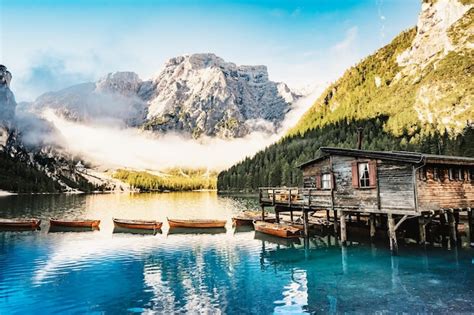 Premium Photo Boats On The Braies Lake Pragser Wildsee In Dolomites