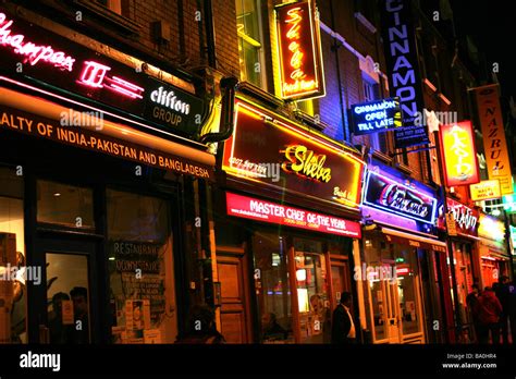 Indian restaurants in Brick Lane, London Stock Photo - Alamy