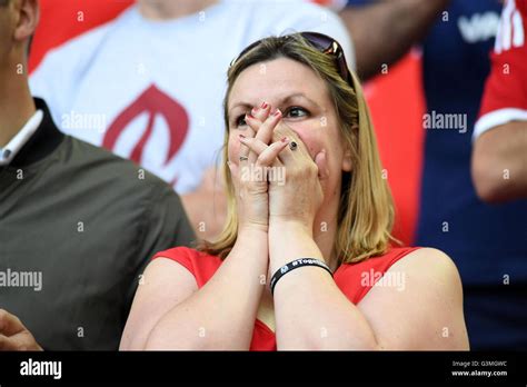 A Welsh Football Fan Waits For The Final Whistle During Wales Against