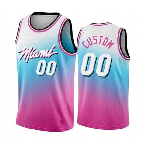 A Custom Basketball Jersey With The Name And Number In Pink Blue And White