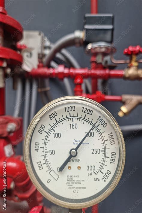 Pressure gauge for measuring installed in water system Stock Photo | Adobe Stock