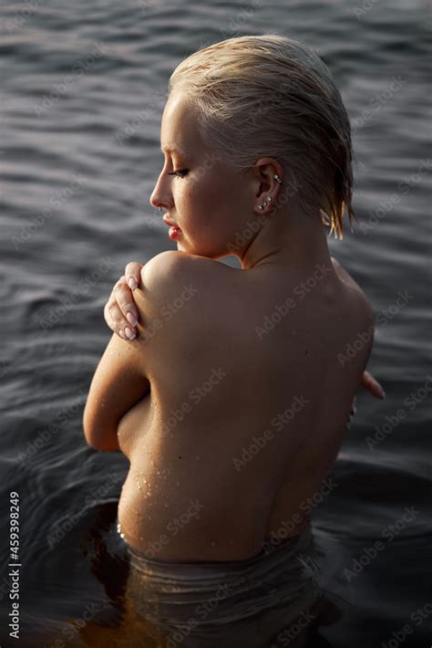 Nude Naked Sexy Woman In Water At Sunset Beautiful Blonde Woman With Short Wet Hair And Big