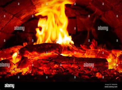 Fire in stove Stock Photo - Alamy