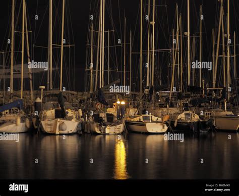 Anchored Boats At Night In The Marina Stock Photo Alamy