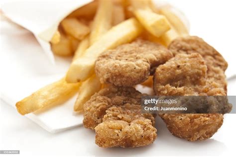 Chicken Nuggets And Fries High-Res Stock Photo - Getty Images