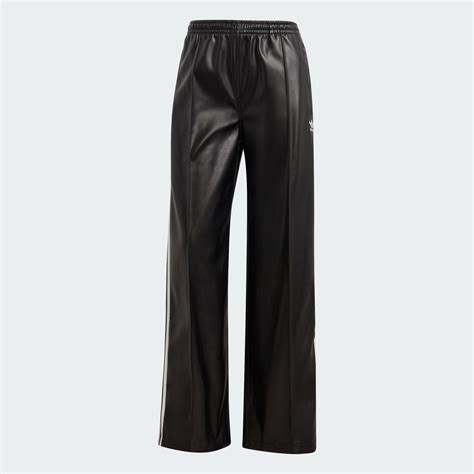 CLOTHING - Firebird Pleather Pants - Black | adidas Oman