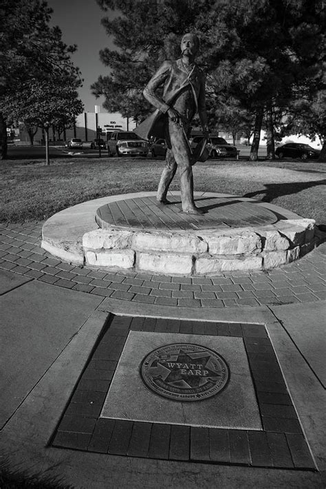 Wyatt Earp Statue In Dodge City Kansas In Black And White Photograph By Eldon Mcgraw Pixels