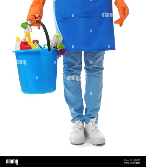 Woman With Bucket Full Of Cleaning Supplies On White Background Stock