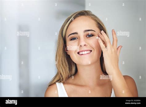 Taking Good Care Of Her Skin Cropped Shot Of An Attractive Young Woman