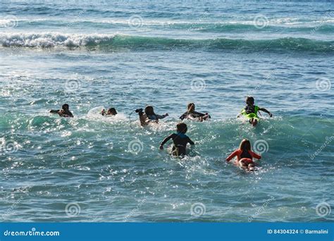 Surf School - Several Surfboarding Students Headed into an Ocean Editorial Stock Image - Image ...