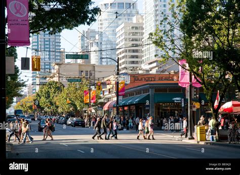 Looking Down Robson Street One Of The Main Shopping Streets Of Vancouver Bc Canada Stock