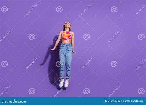 Photo Of Positive Lovely Cute Girl Wear Stylish Clothes Fly Air Empty