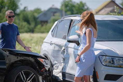 Drivers Of Smashed Vehicles Arguing Who Is Guilty In Car Crash Accident