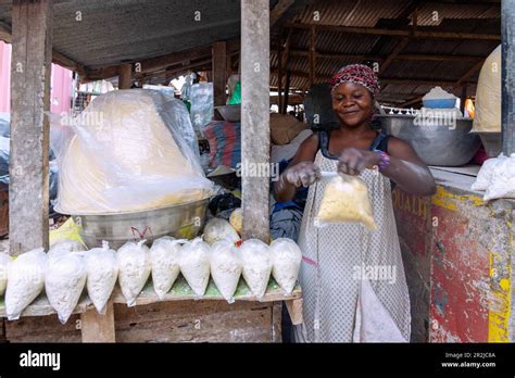 Selling Cassava Flour And Tapioca At The Weekly Market In Techiman In