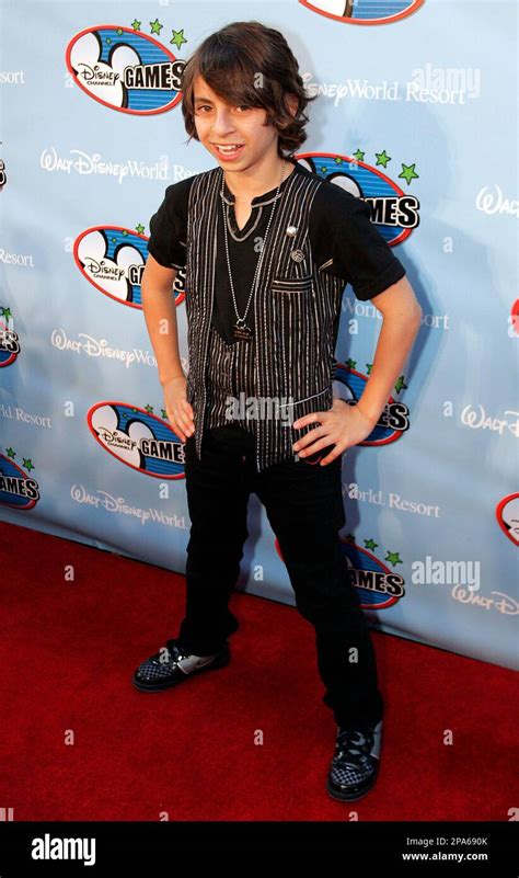 Moises Arias of "Hannah Montana" poses on the red carpet for the Disney ...