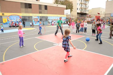 Kids Playing Basketball At Recess