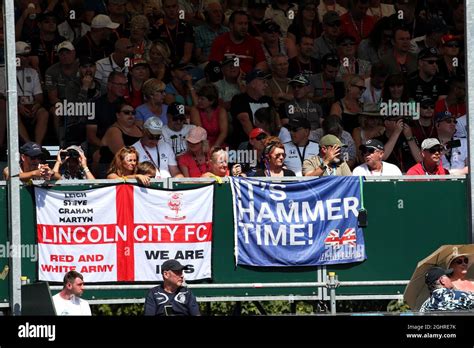 Lewis Hamilton (GBR) Mercedes AMG F1 fans and Lincoln City FC fans in the grandstand. 07.07.2018 ...