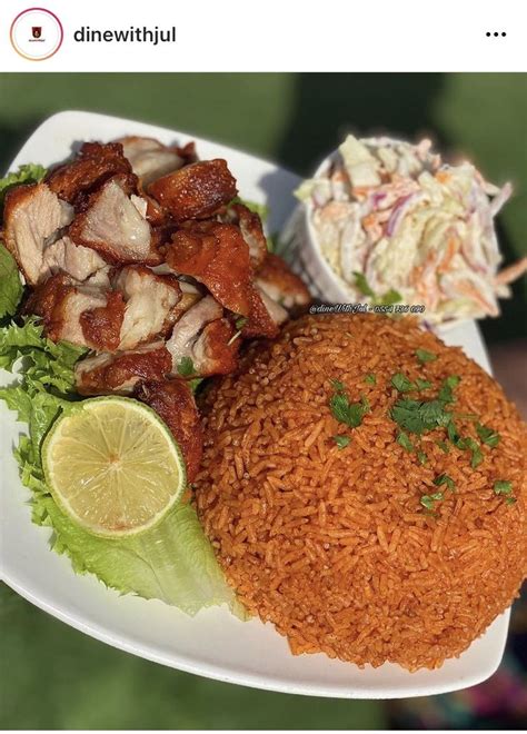 A Plate With Rice Meat And Lettuce On It