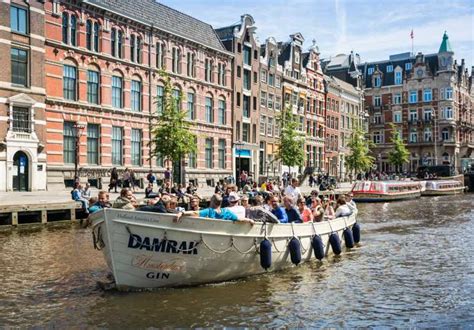 Amsterdam: Sighting Boat Tour with Unlimited Drinks | GetYourGuide