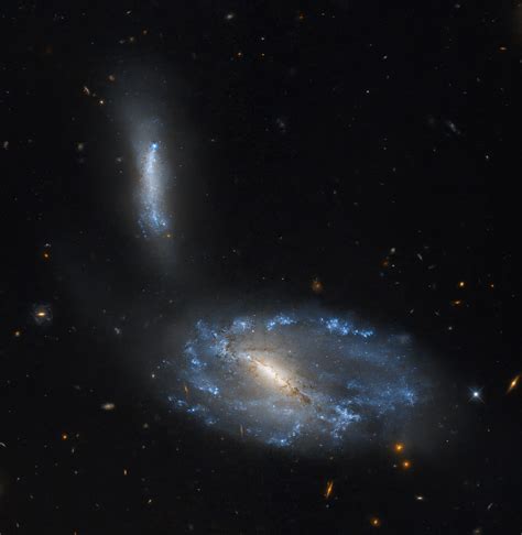 Hubble Studies a Sparkling Galaxy Pair - NASA Science