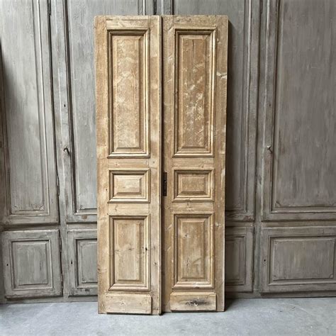 Stripped double closet door Matériaux Authentiques