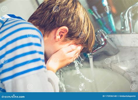 Boy Wash His Face in the Bathroom New Day of Everyday Life Stock Photo ...