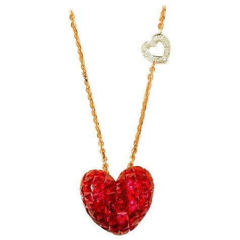 18 Karat White Gold Ruby And Diamond Heart Necklace In Invisible