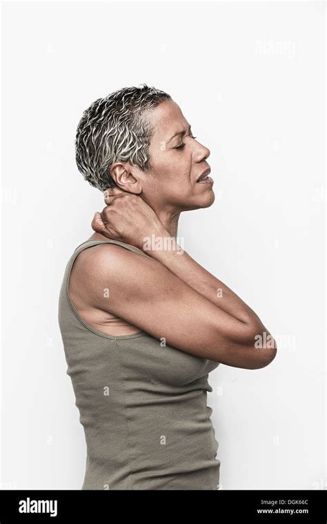 Senior Woman With Neck Pain Stock Photo Alamy